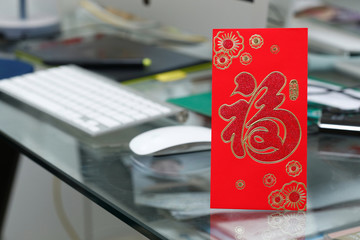 red envelope gift on table work of chinese new year celebration