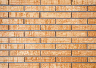 Fototapeta premium Brown brick stone wall seamless background and texture