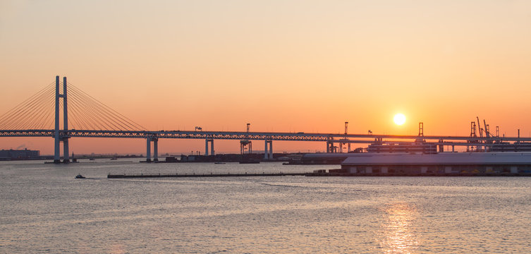 Bay Bridge over sunrise in Yokohama, Japan..