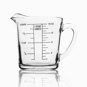 A vector drawing of a 10 ml measuring cup. liquid measurement