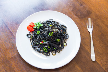 Pasta with squid ink and seafood