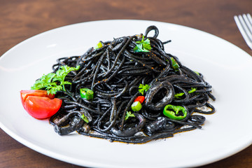 Pasta with squid ink and seafood