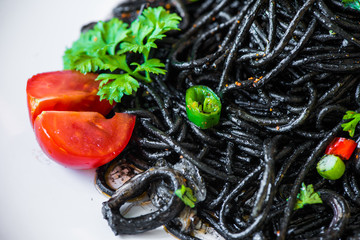 Pasta with squid ink and seafood