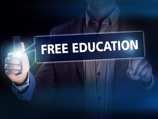 Businessman presses button free education on virtual screens. Bu
