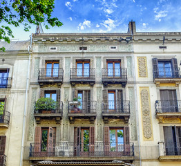 Facade of typical residential building in  Eixample district