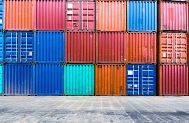 stack of containers with empty road in front