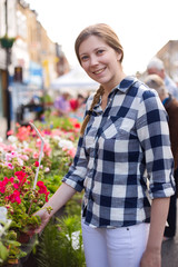 young woman at the flower market