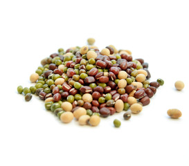 Mixed dried beans on a white background