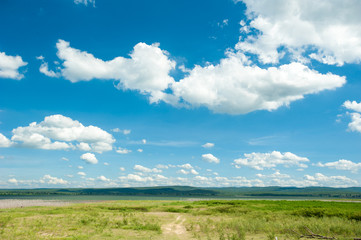 River and the field on a sunny