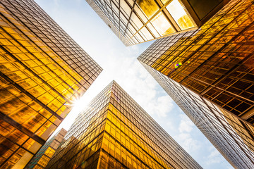 low angle view of modern skyscraper exterior and sky
