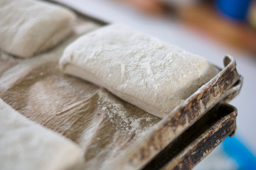 Yummy Fresh Raw Ciabatta Loaf on Tray
