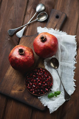 Still life with ripe pomegranates, high angle view, studio shot
