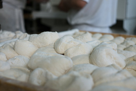 Raw Bread Dough in Front of Bakers