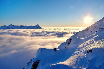 Winter mountain landscape with sea of clouds. Tatra Mountains in Poland.