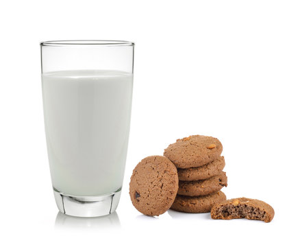 cookies and milk on a white wooden background