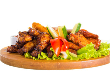 Fried chicken wings with vegetables
