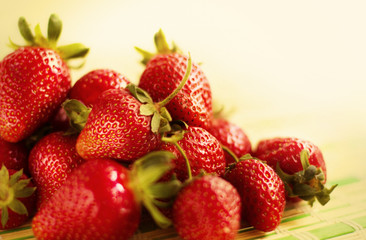 Fresh juicy strawberries lying on the table.