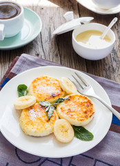pancakes from cottage cheese  with  banana,  condensed milk, and