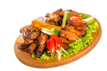 Fried chicken wings with vegetables
