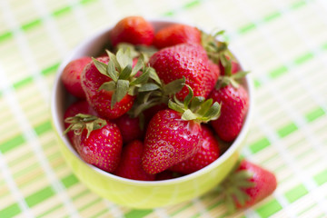 Fresh ripe perfect strawberry at the plate.