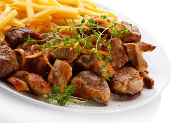 Kebab, chips and vegetables 