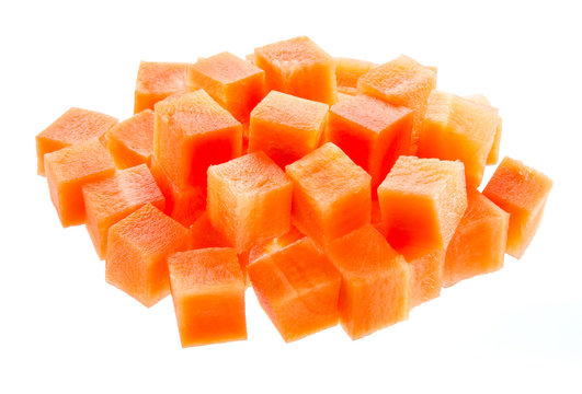 Carrot cubes isolated on white