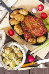 Potato salad and bacon rib with roasted potatoes. Farmhouse styl