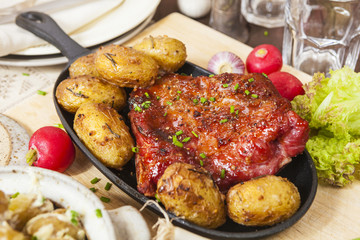 Bacon rib and potatoes. Farmhouse style meal.