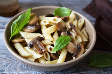 Pasta with mushrooms in a bowl