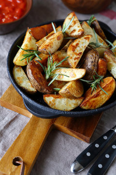 Baked potatoes in a pan