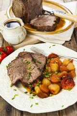 Roast beef joint with roast vegetables