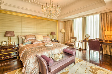 luxury hotel bedroom with upscale furniture and modern style dec