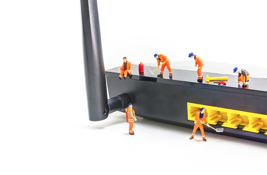 image of mini figure dolls engineer fix internet wifi router  is