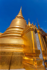 Fototapeta premium Golden Pagoda at Wat Phra Kaew - the Temple of Emerald Buddha in Bangkok, Thailand