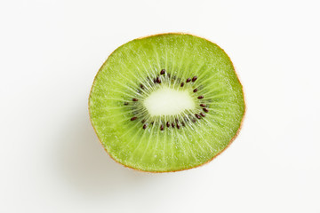 close up of ripe kiwi slice on table