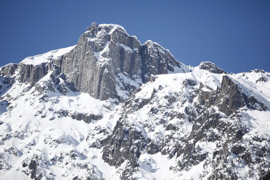 Chamonix - Scenic view of snow covered Mont Blanc with a clear blue sky in the background