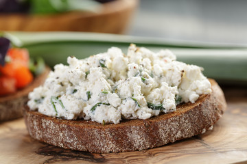 rye sandwich or bruschetta with ricotta cheese and herbs