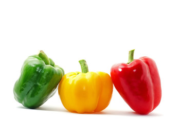fresh yellow, red bell peppers on white background