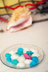 Figurines made of sugar in a glass dish