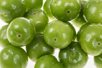 green plums as a background