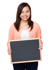 Asian woman show with black board