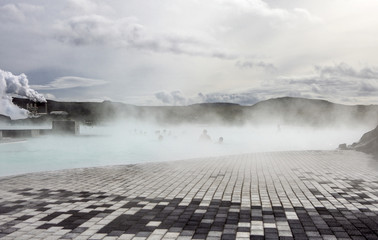 The lagoon is a man-made lagoon which is fed by the water output of the nearby geothermal power plant Svartsengi