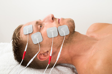 Man With Electrodes On Face