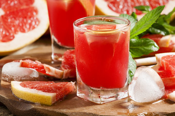 Fresh juice of red grapefruit, selective focus