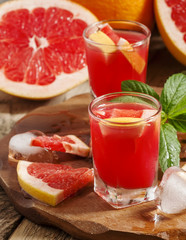 Fresh juice of red grapefruit, selective focus
