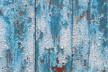 chipped paint on the door of the old boards texture background
