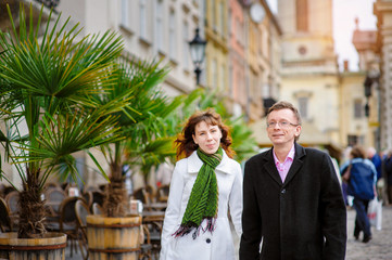 loving couple walking through the old Lviv