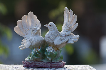 Doves watching over a gravestone