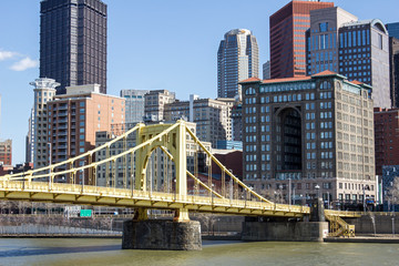 Yellow Bridge and City - Yellow Painted Iron Suspension Bridge Across the Allegheny River Toward Downtown Pittsburgh Pennsylvania