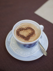 Coffee mug with a heart inside.